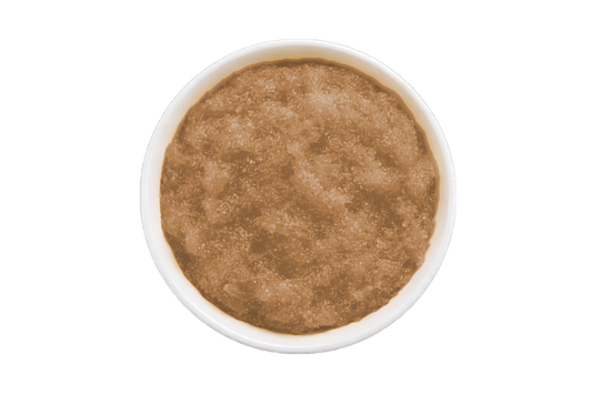 Brown scrub in a white container on a white background