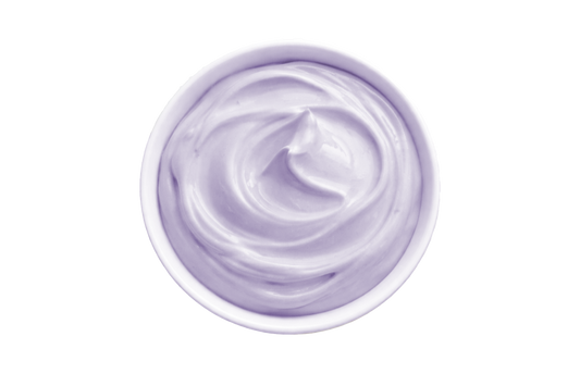 White cream in a small container on a white background