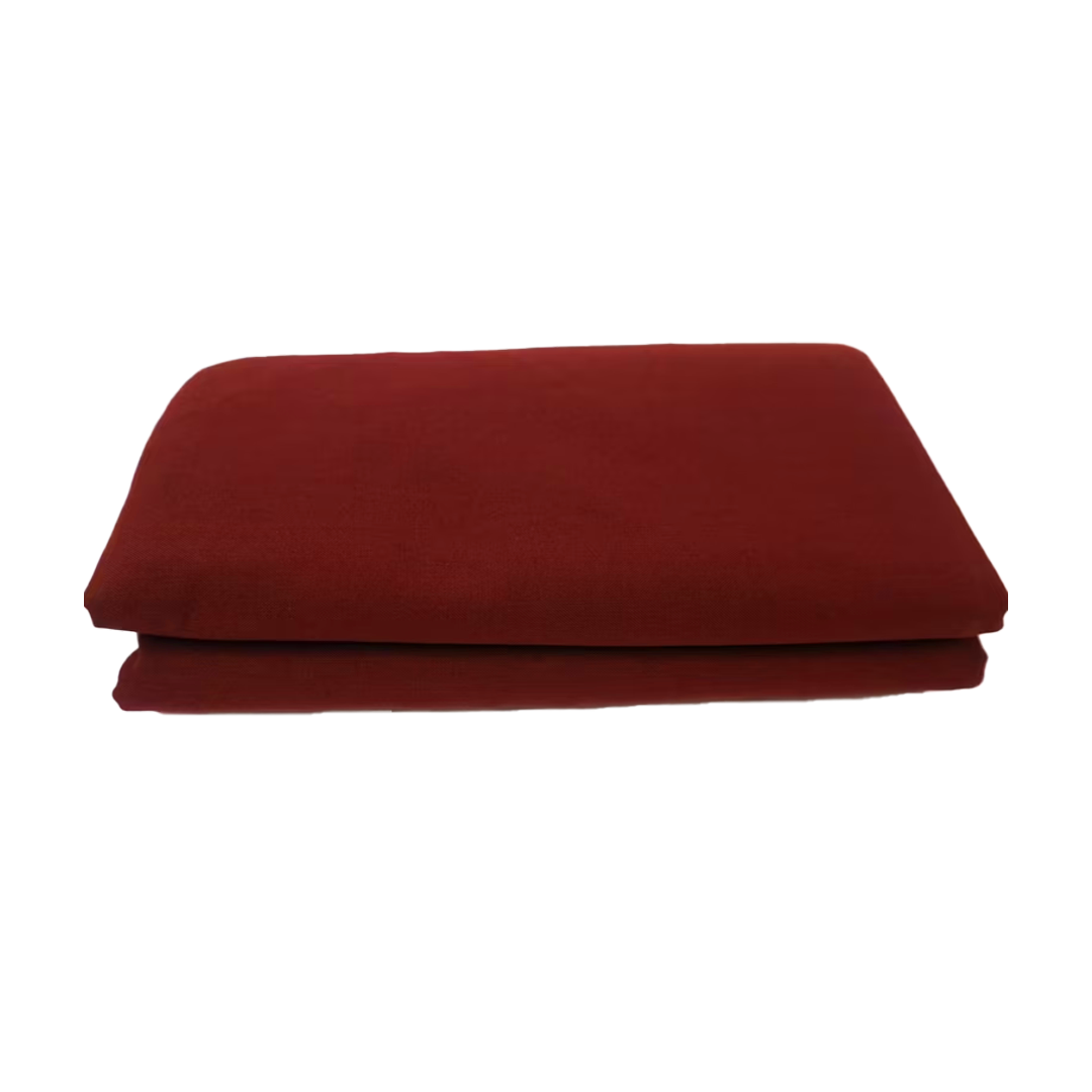 Folded red blanket on a white background