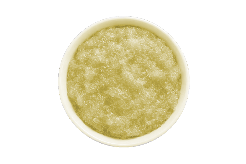 Amber scrub in a white bowl on a white background