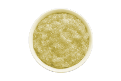Amber scrub in a white bowl on a white background