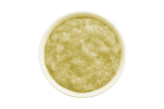 Amber scrub in a white bowl on a white background