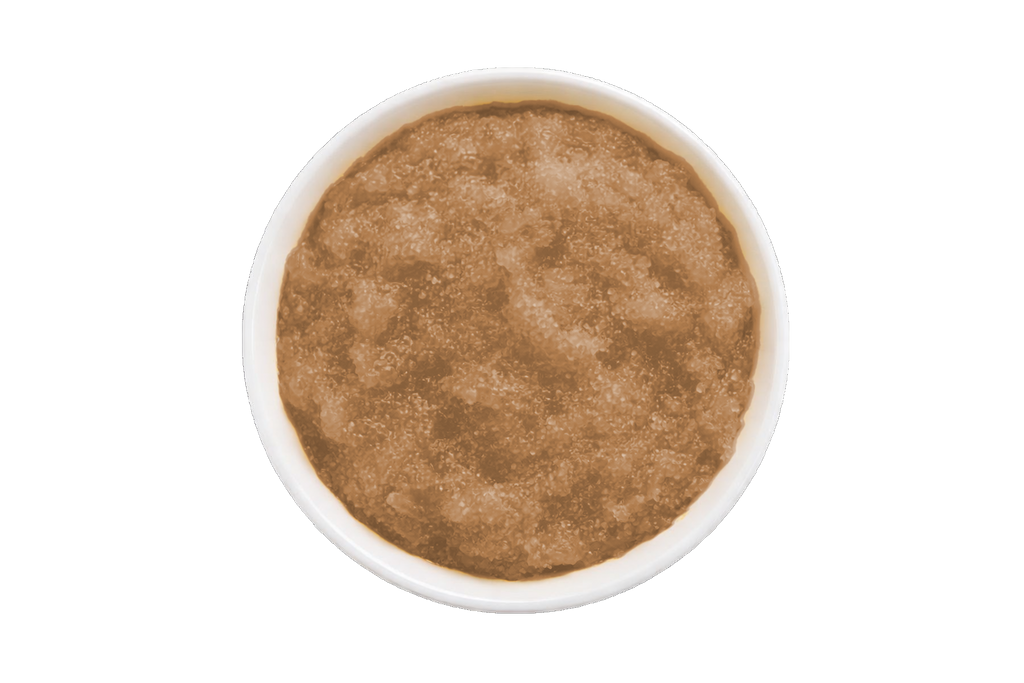 Brown scrub in a white container on a white background