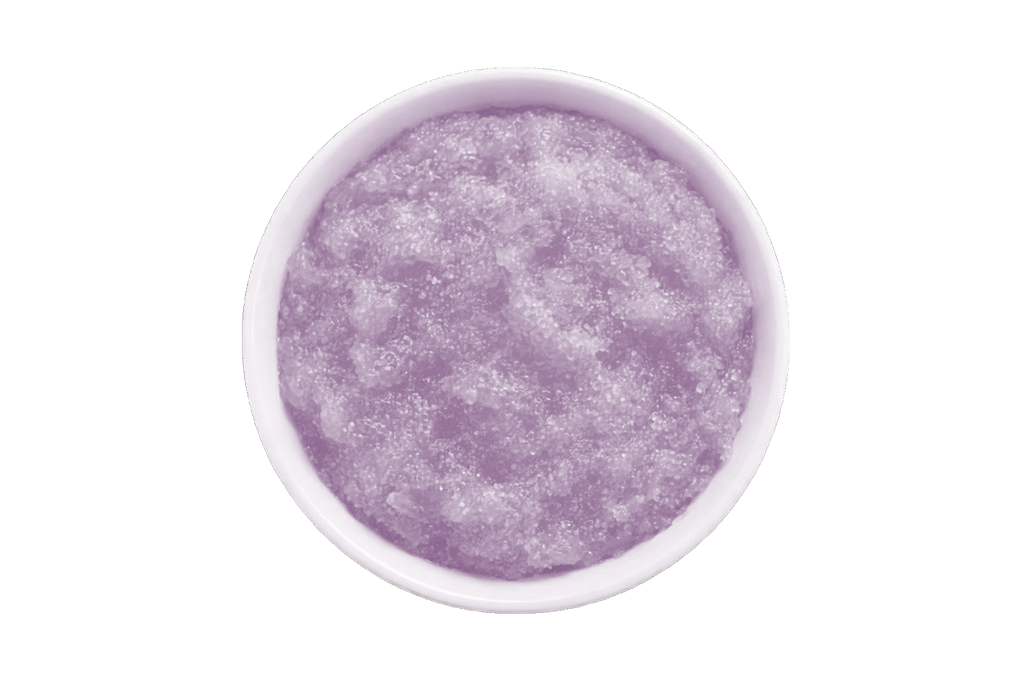 Purple scrub in a white bowl on a white background