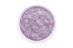 Purple scrub in a white bowl on a white background