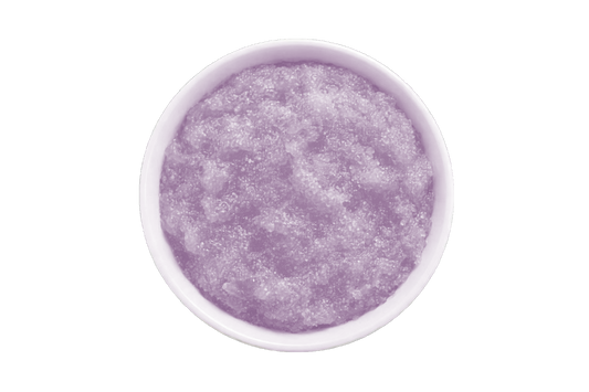 Purple scrub in a white bowl on a white background