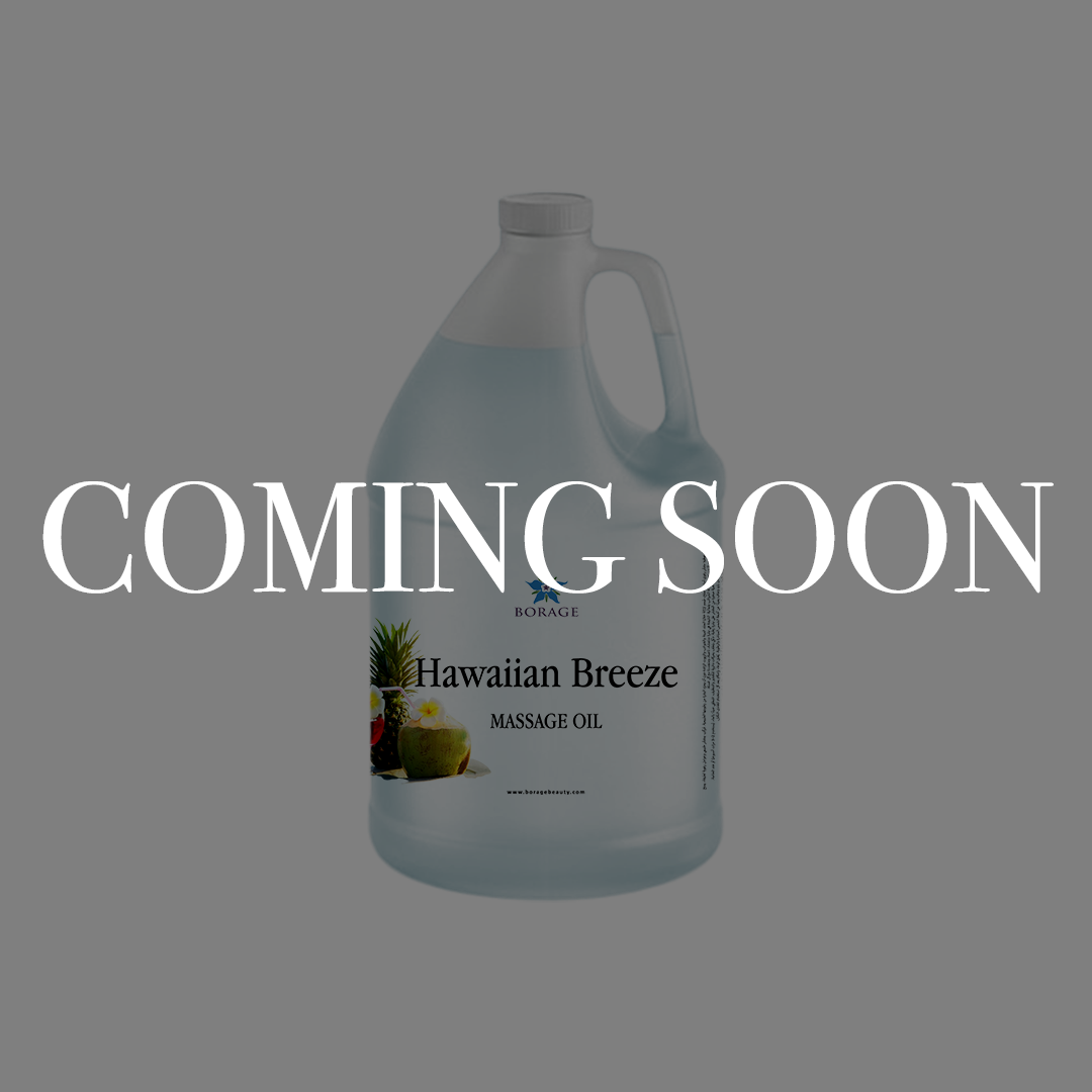 A large plastic jug of Hawaiian Breeze Massage Oil by BioRANGE, shown on a solid gray background with a large 'COMING SOON' text overlay across the center.
