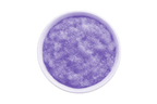 Purple scrub in a white bowl on a white background