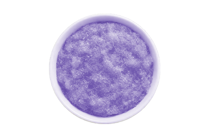 Purple scrub in a white bowl on a white background