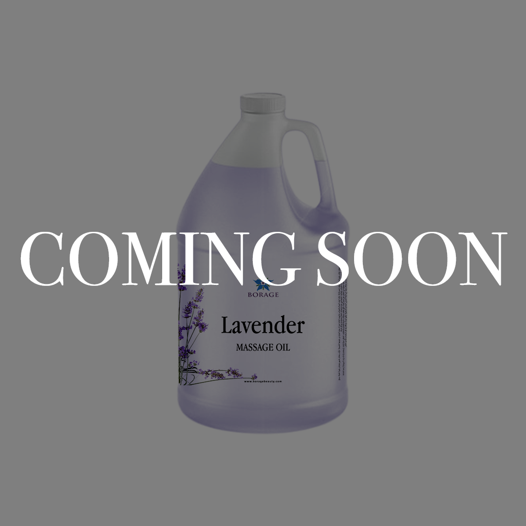 A large plastic jug of lavender massage oil on a gray background with a large white 'COMING SOON' text overlay across the center.