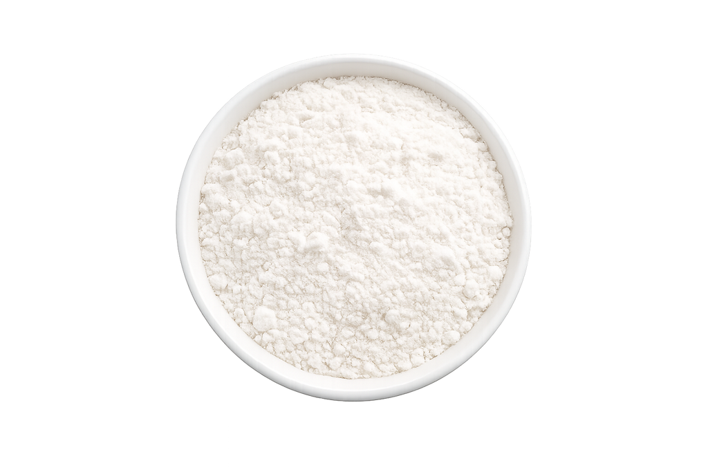 White powder in a bowl on a white background