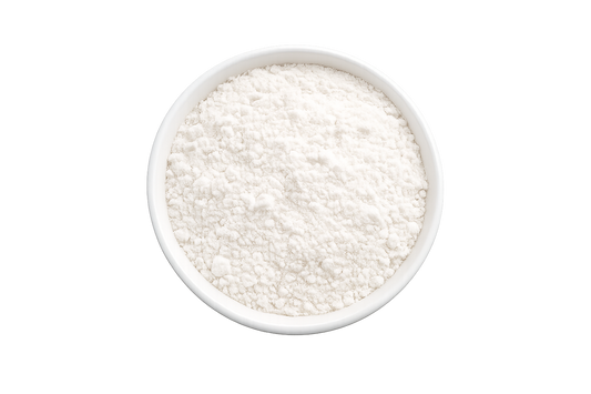 White powder in a bowl on a white background