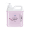 Bottle of Sakura massage oil on a white background