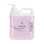 Bottle of Sakura massage oil on a white background