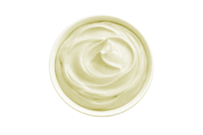White cream in a small container on a white background