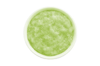 Green smoothie in a white bowl on a white background
