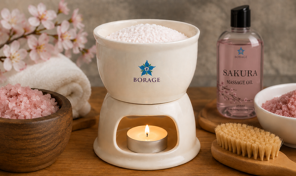 BORAGE Sakura Massage Heater with Sakura Massage Oil in spa treatment setting